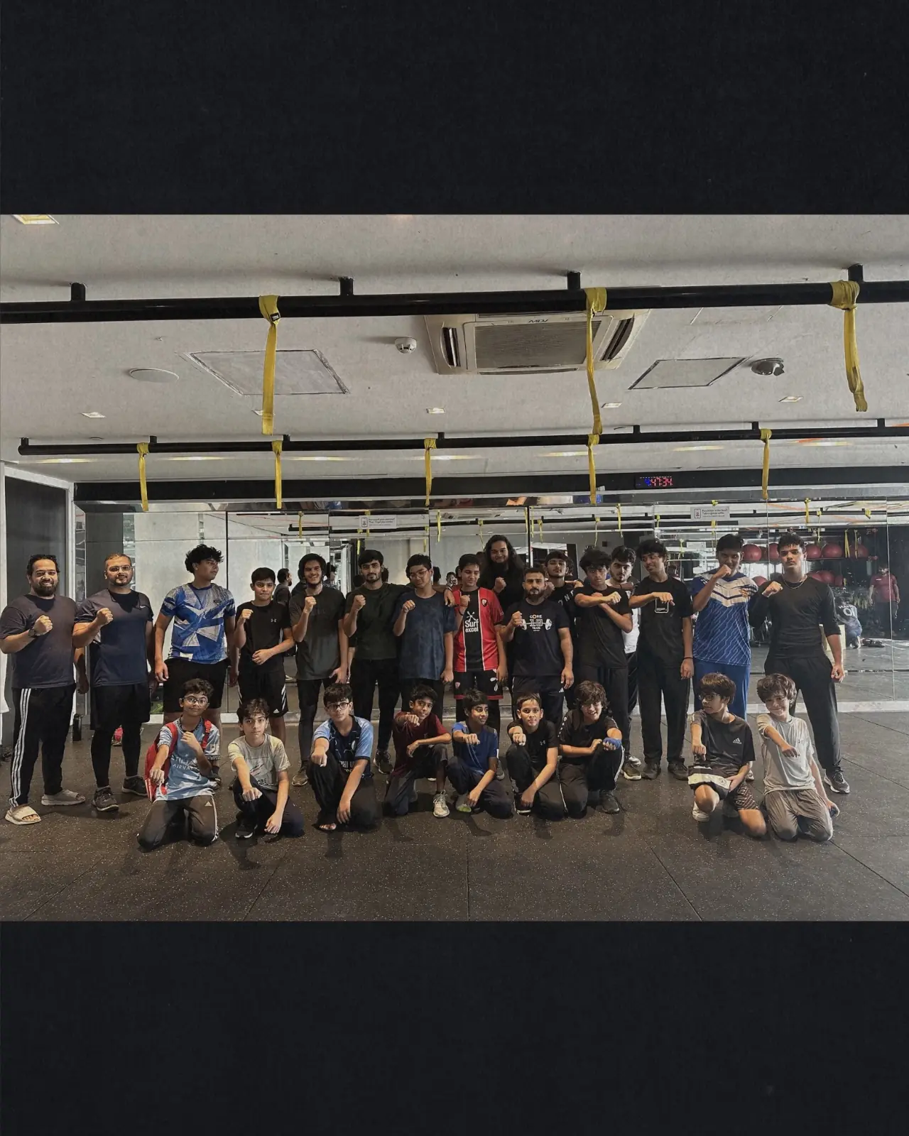 Unbeatable participants and coaches gather together after training
